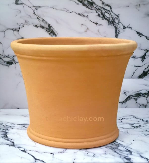 clay planter on marble slab