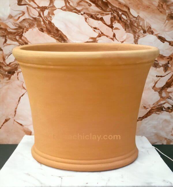 large terra cotta on marble slab