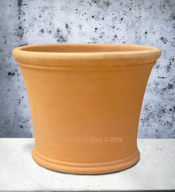 large terracotta planter on concrete floor