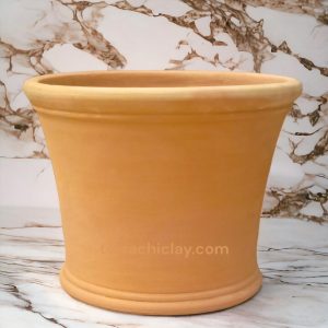 clay planter on marble floor