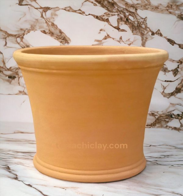 clay planter on marble floor