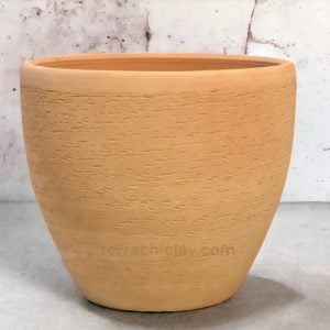 Range of Terracotta Pots 40 big clay planter on cement floor.