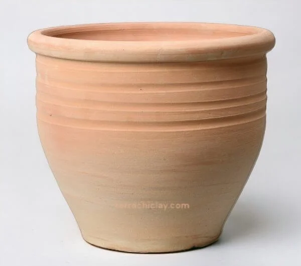 clay pot in grey room