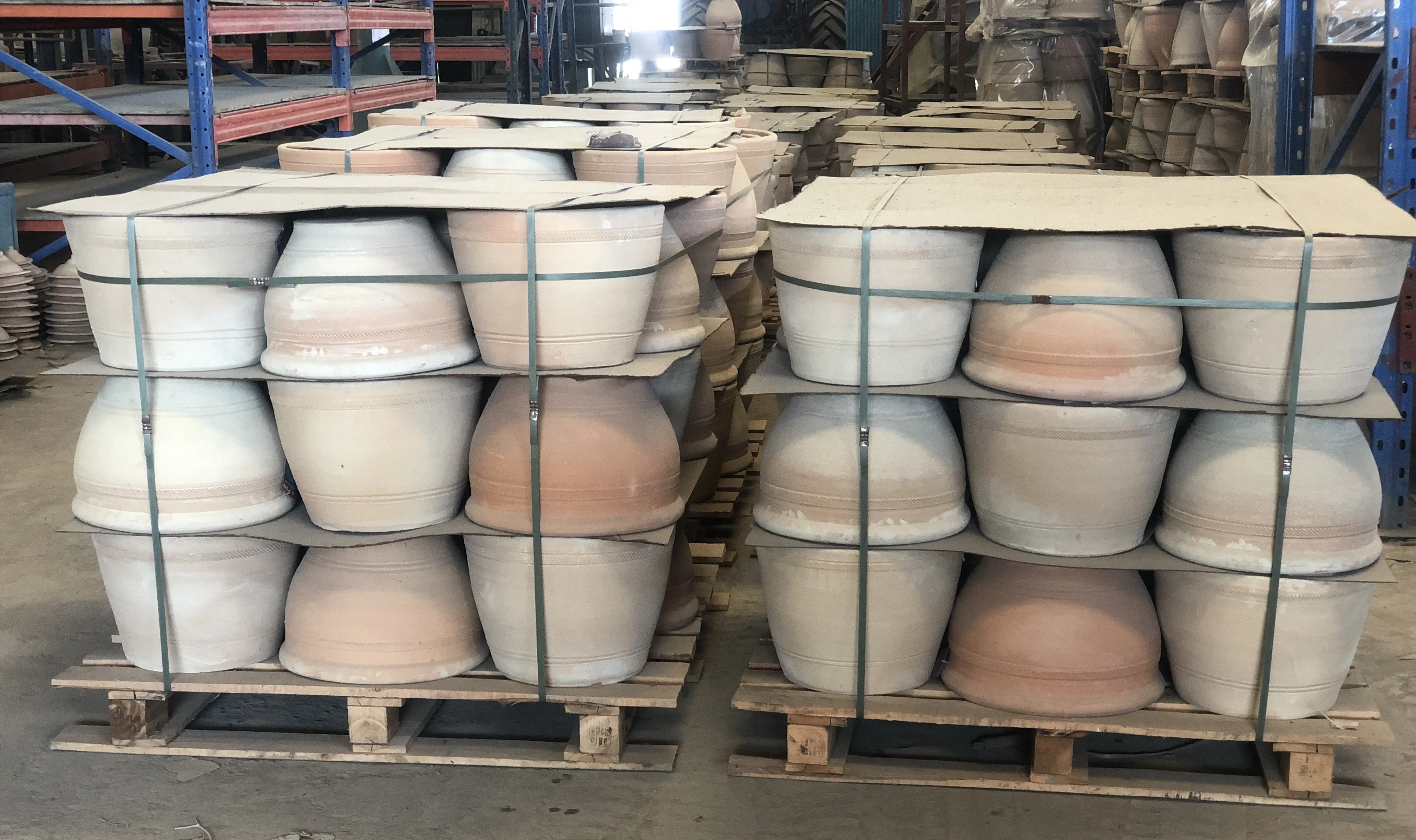 Terracotta pots arranged from extra small to extra large showing size progression for home gardens, patios, and commercial landscape projects
